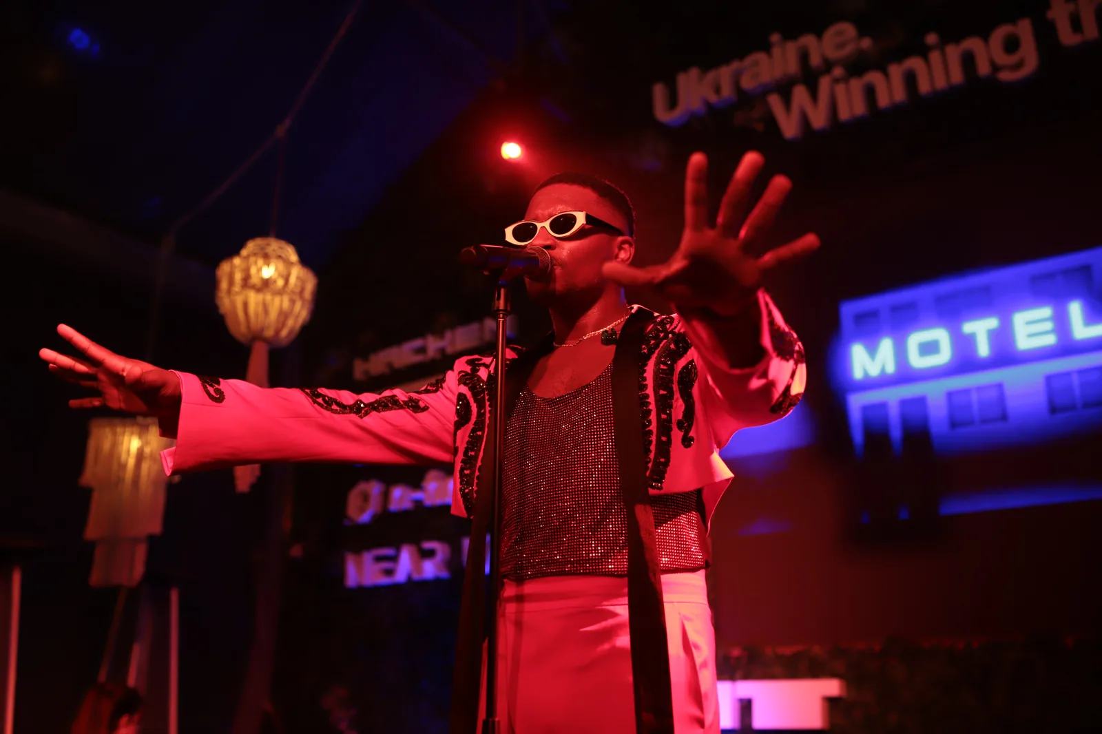 Live performer on stage at a BTQ event production