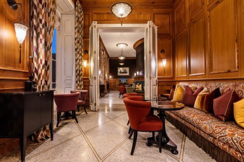 Vidago Palace Clubhouse restaurant — Siza-modern interior inside restored 1886 stone building